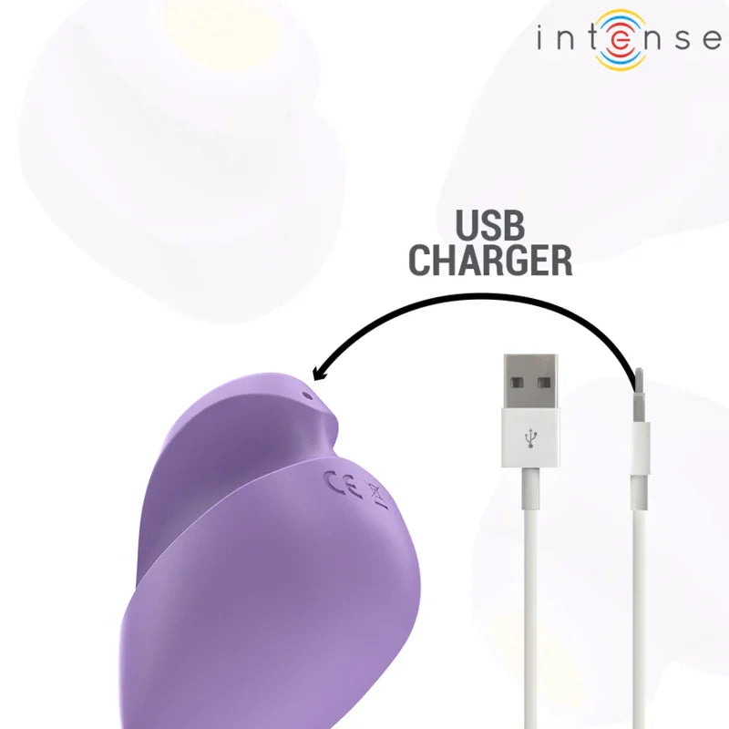 Estimulador vibratorio morado con carga USB y cable, conector visible