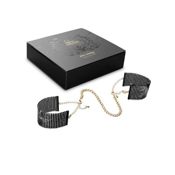 Esposas de malla metálica negra con cadenas doradas y brazaletes para muñeca