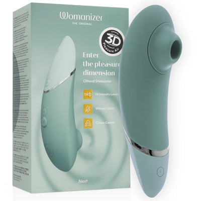 Estimulador de clítoris WOMANIZER Next verde claro con caja y dispositivo