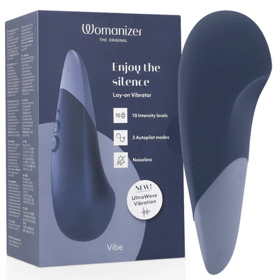Vibrador de silencioso lay-on azul oscuro con forma ergonómica y estuche de caja